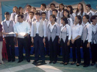 Congressman Raul Gonzales, Jr. and Renato Pantaleon with the graduates.