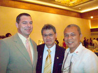 Past President Dieter Soukup, Disctrict Governor Sy and Rotary Club Director Ariston Miñez Jr.