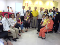 The men and women of Equicom pose with the guests.