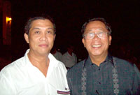 Gideons National President Ray Moleno (r) is welcomed by Robert Javellana who hosted the induction in his Bago City farmhouse last Saturday.