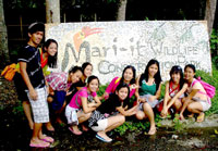 University of San Agustin tourism students at the netrance of Mari-it Wildlife Conservation Park inside the College of Agriculture.