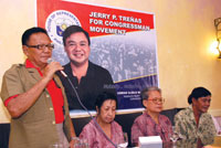Mr. Rodolfo Eslita (standing), convenor of Jerry Treñas for Congressman Movement, fields questions from the media. Also shown in photo (from left) are Evelyn Salarda, Belen Peñaflor, and retired policeman Vir de los Reyes.