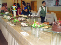 Along table of chocolate treats.