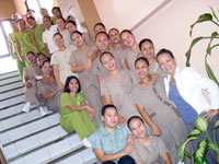 Babes Rivera (bottom, right) with the Spa Riviera staff.