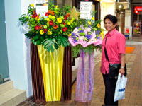 Rey marvels on floral arrangements at the Orchard Road, Singapore.