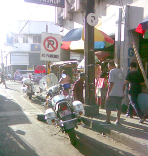 IN FLAGRANTE DELICTO. Two motorcycles of Iloilo City’s Traffic Management and Engineering Unit (TMEU)