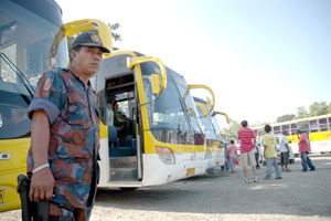 A policemen secures a bus terminal