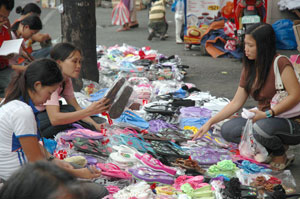 Traders display their assorted goods from 5 in the afternoon until the evening at the Iloilo City sidewalk.