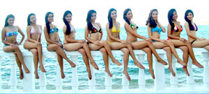 Lovely candidates of Miss Paraw Regatta 2010, in their bikinis, gamely pose in front of photographers at the Villa Igang resort in Nueva Valencia, Guimaras.