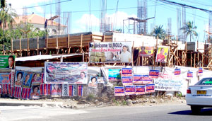 This area near the plaza in Molo district is not a common poster area designated by the Commission on Election (Comelec) but it is full of campaign posters by both local and national candidates even before the start of the campaign period for national positions.