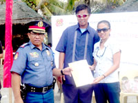 PSSUpt Ren Darroca presents the Certificate of Appreciation for Ramon Avancena High School.