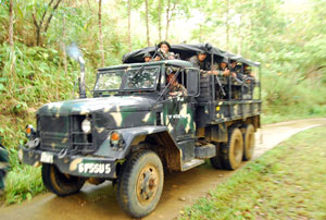 An Army truck loaded with soldiers patrol the hinterlands of Central Panay.