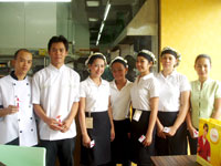 The staff of Green Mango - Nelly's Garden Branch.