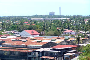 The ongoing construction of the generating plant and the smokestack of the 164 MW coal fired power plant is prominently seen on the skyline of La Paz district.