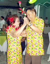 The birthday celebrator Trini with her husband John Badevarrona.