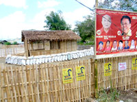 The headquarters of mayoralty candidate Benjamin Malaga in Brgy. Naslo Maasin, Iloilo, surrounded by sandbags, looks like a war camp creating fear among residents in the area.