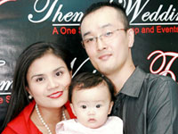 Princess Herrera Lee and Chris Lee and their baby.