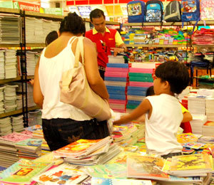 Parents start buying notebooks and other school supplies for their children as the opening of another school year nears.