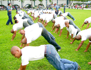 DRILL. New recruits of Police Regional Office 6 perform a drill under the supervision of police officers
