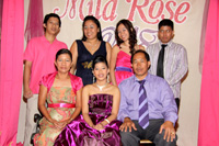 The Jardeleza Family. Editha is seated at the left while Angelo is standing at the right.