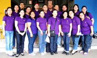 The GS '85 and HS '89 group in their official purple uniform for the medical mission.