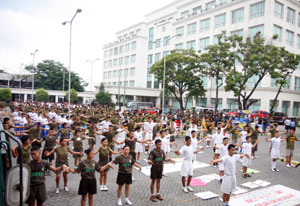 FITNESS ACTION. About 500 participants from various government agencies and schools do a warm-up exercise in front of Iloilo Provincial Capitol