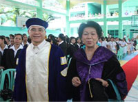 Dr. Expedito Seneres, FCU president with CHED commissioner, Dr. Nona Ricafort.