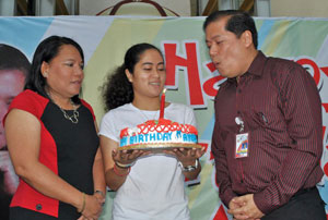 Iloilo City Mayor Jed Patrick Mabilog, who turned 44 yesterday, blows the candle on his birthday cake.