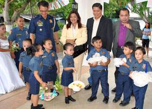 Iloilo City Mayor Jed Patrick Mabilog, Chief Supt. Samuel Pagdilao Jr., and Councilor Joshua Alim act as principal sponsors