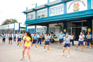 Personnel of Police Regional Office 6 do the taebo exercise with their instructor at Camp Delgado in Iloilo City.