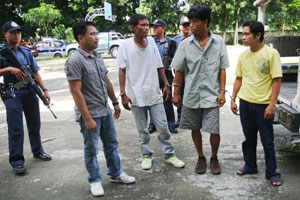 The four hold-up suspects arrested for robbing a Total gasoline station in Cabatuan, Iloilo.